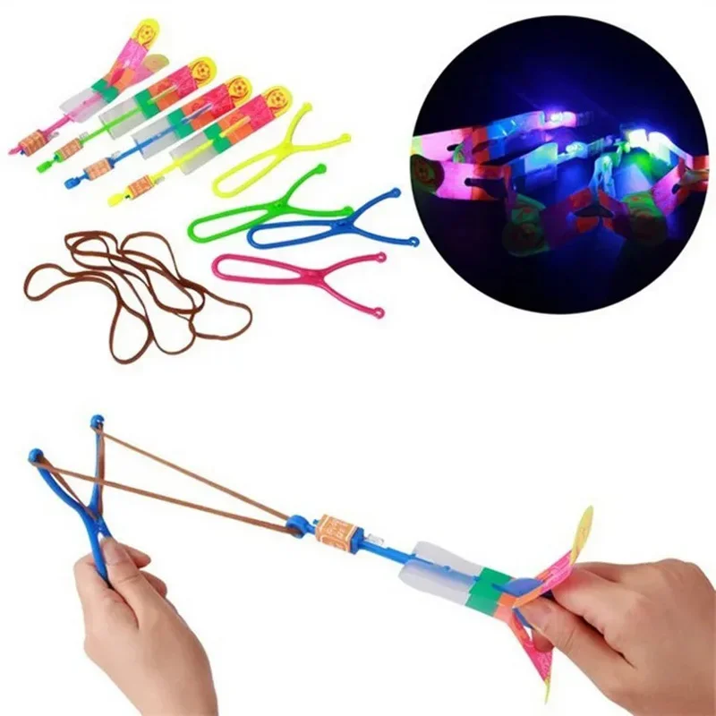 5/10Pc LED Flying Arrow Rocket Toys - Rubber Band Catapult Helicopter Light Party Fun Best Gifts For Kids Outdoor Play - الصورة 3